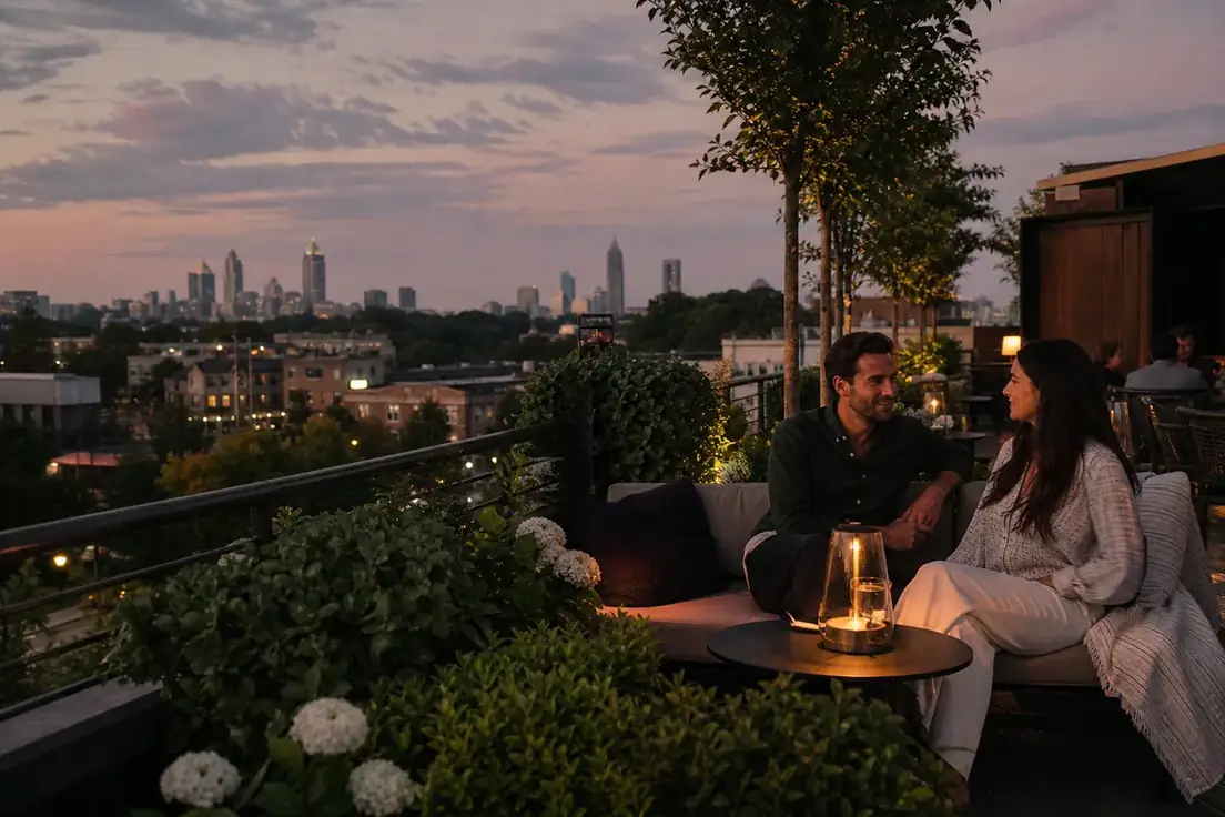 An adult couple on an Old Fourth Ward rooftop at dusk